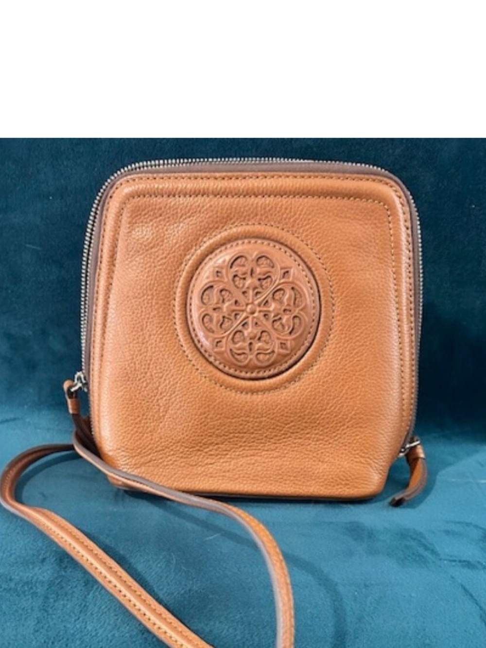 Leather Crossbody Bag with Embossed Medallion - Tan